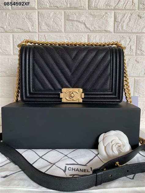 chanel le boy chevron black caviar|Handbags .